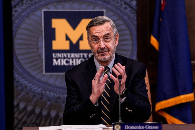 U-M interim president Domenico Grasso applauds during a special regents meeting at University of Michigan’s Ruthven Building in Ann Arbor on Monday, Jan. 12, 2026.