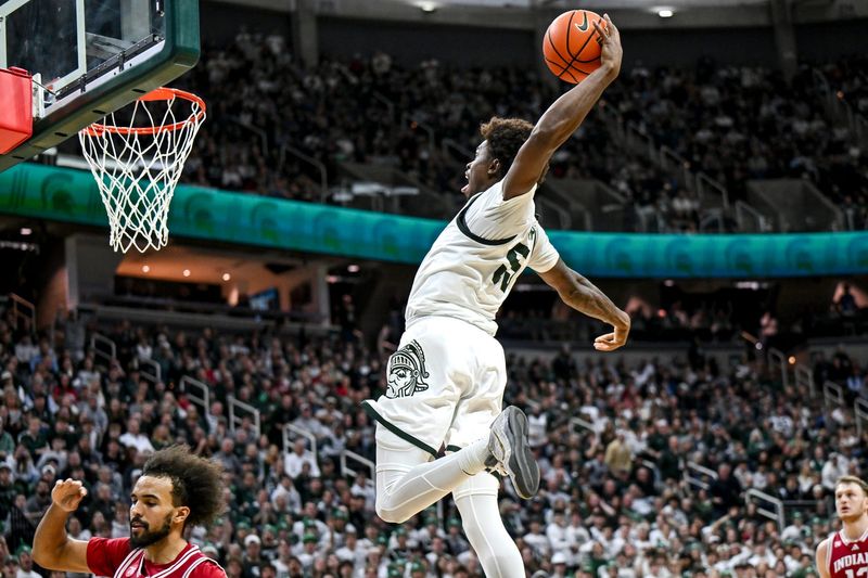 Michigan State's Coen Carr dunks against Indiana during the second half on Tuesday, Jan. 13, 2026, at the Breslin Center in East Lansing.