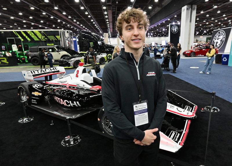 David Malukas, driving #12 for Team Penske, was among IndyCar/IMSA Weathertech drivers giving visitors hot laps at the Detroit Auto Show at Huntington Place on Tuesday, Jan. 20, 2026.
