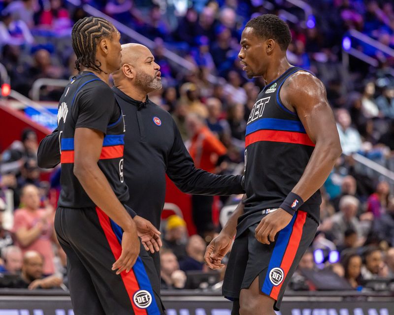 Detroit Pistons head coach J.B. Bickerstaff talks to Detroit Pistons guard Ausar Thompson (9) and center Jalen Duren (0) on a timeout against the Houston Rockets during the first half at Little Caesars Arena in Detroit on Friday, Jan. 23, 2026.