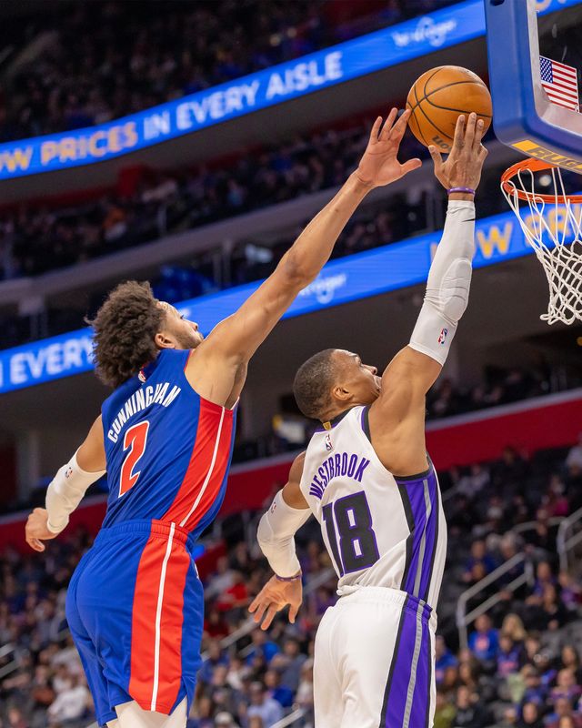 Detroit Pistons guard Cade Cunningham blocks a layup attempt from Sacramento Kings guard Russell Westbrook during the first half at Little Caesars Arena, Jan. 25, 2026.