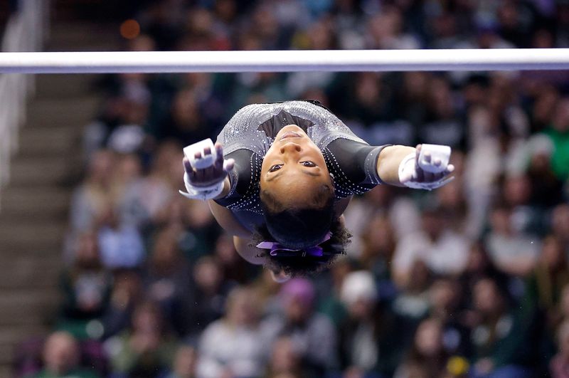 Michigan State's Olivia Zsarmani competes on the bars, Sunday, Jan. 25, 2026, East Lansing