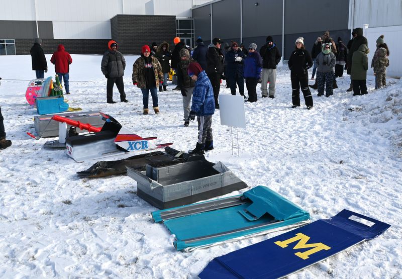 Cardboard sleds were judged on best use of materials and best design before heading down Kiwanis Hill for distance at Coldwater's Winterfest Saturday, Jan. 24 in Heritage Park.