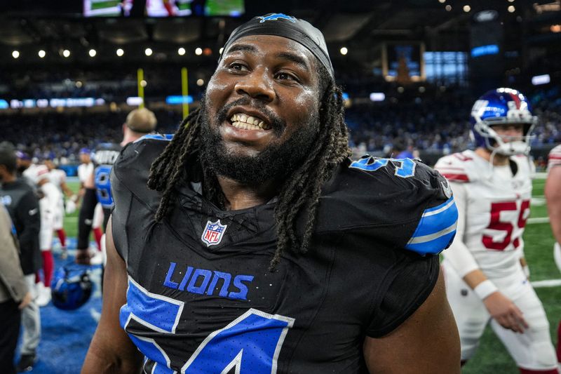 Detroit Lions defensive tackle Alim McNeill (54) celebrates 34-27 win over New York Giants at Ford Field in Detroit on Sunday, Nov. 23, 2025.