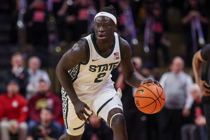 Jan 27, 2026; Piscataway, New Jersey, USA; Michigan State Spartans guard Kur Teng (2) dribbles up court against the Rutgers Scarlet Knights during the first half at Jersey Mike's Arena. Mandatory Credit: Vincent Carchietta-Imagn Images