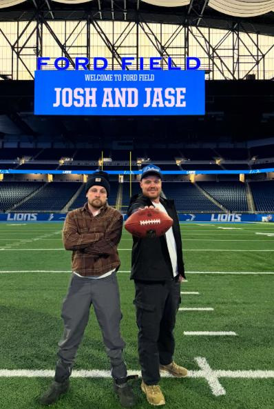 British content creators Josh Cauldwell-Clarke, left, and Jason “Jase” Riley, at Ford Field in Detroit in January 2026.