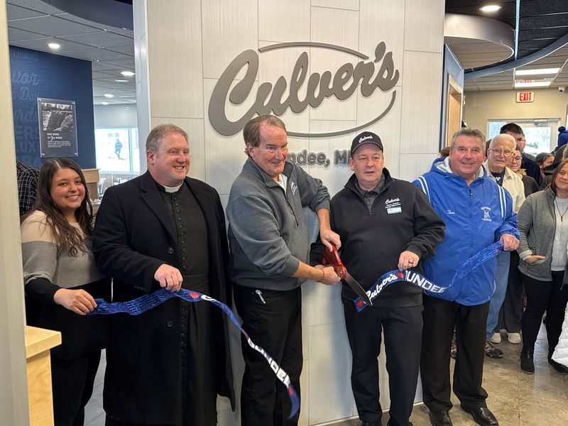 Emily Olinik, Father John Parado of Holy Spirit Catholic Church in Brighton, Gerry Olinik, co-owner and operator Sean Carleton, Dundee village president Tim Bordine cut the ribbon at Dundee Culver's grand opening Feb. 2.