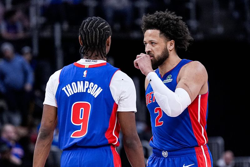 Detroit Pistons guard Cade Cunningham (2) talks to guard Ausar Thompson (9) before a play against Denver Nuggets during the first half at Little Caesars Arena in Detroit on Tuesday, February 3, 2026.