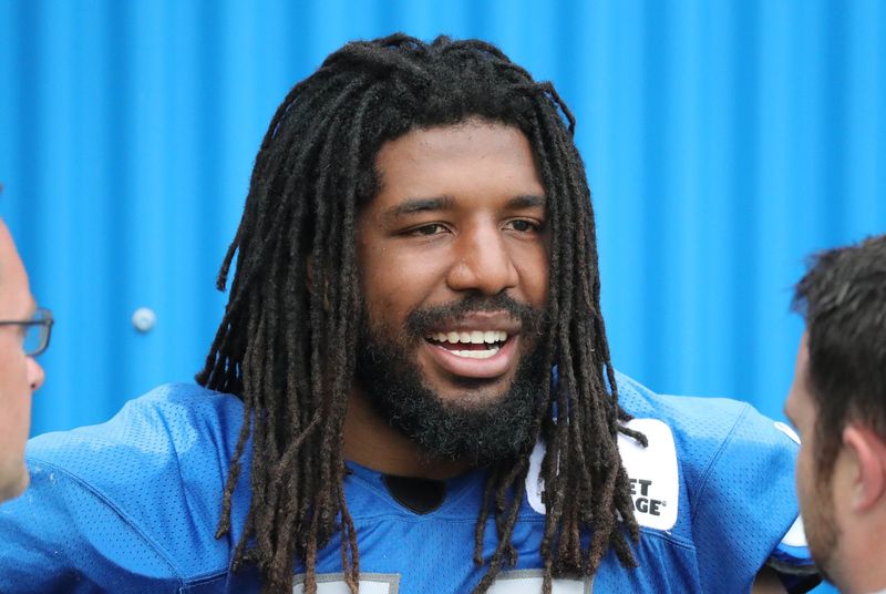 Detroit Lions line backer Jalen Reeves-Maybin talks with reporters after practice August 1, 2018, at the practice facility in Allen Park.