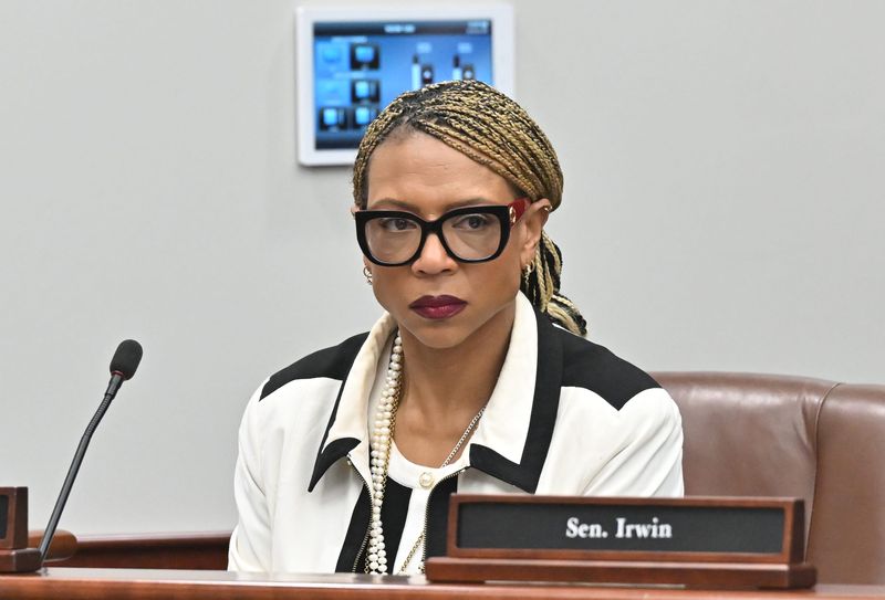 Senator Sylvia Santana listens on during public hearing of the Senate Civil Rights, Judiciary and Public Safety Committee concerning bills 508,509,510, on the tactics of ICE and Border Patrol, in Lansing, Michigan on January 29, 2026.