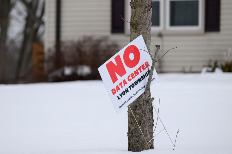 A sign against a proposed data center can be seen on Fletcher Lane, in New Hudson, February 5, 2026.