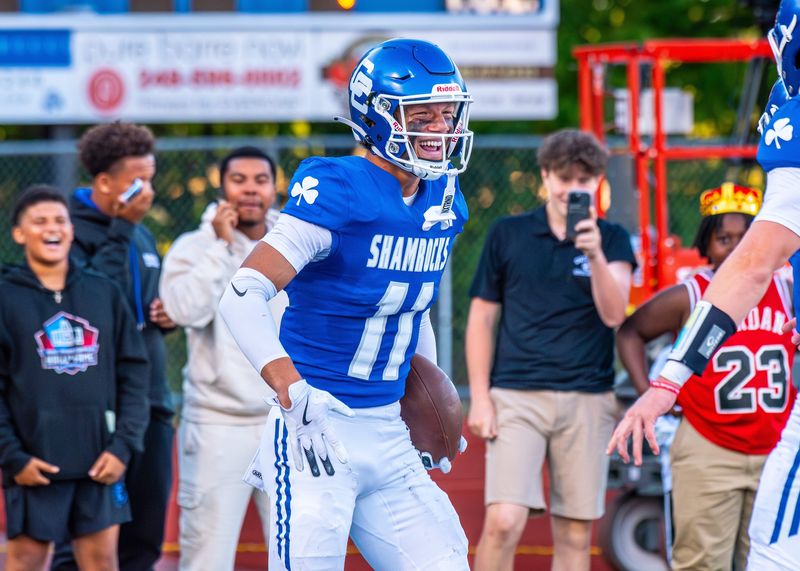 Detroit Catholic Central's Gideon Gash celebrates a touchdown during a football game on Friday, Aug. 29, 2025.