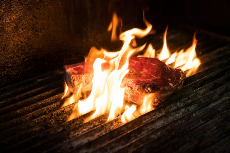 A steak is chargrilled at the Clawson Steakhouse, photographed on Wednesday, Feb. 4, 2026.