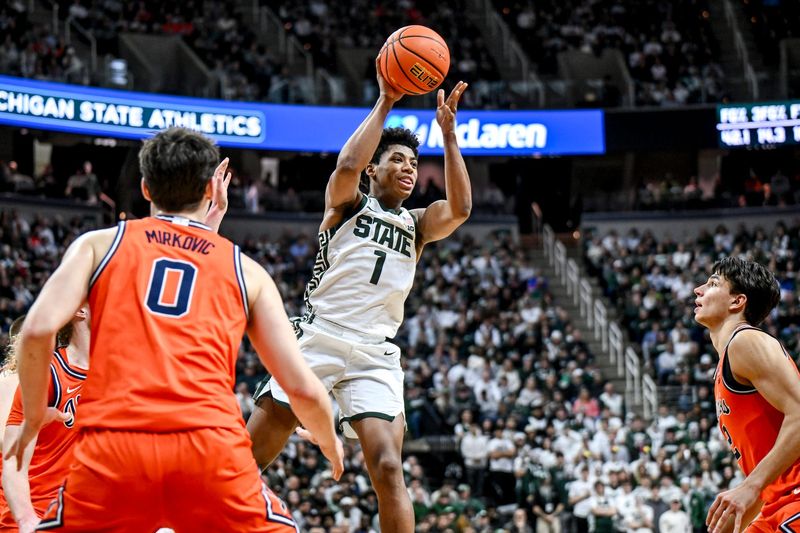Michigan State's Jeremy Fears Jr. passes the ball for an assist to Ker Teng against Illinois during the first half on Saturday, Feb. 7, 2026, at the Breslin Center in East Lansing.