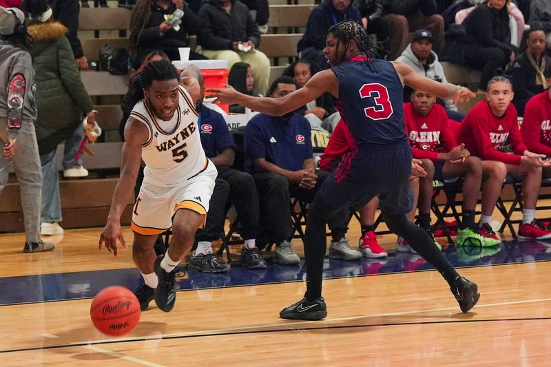 Wayne Memorial guard Jaylohn Allen drives the ball against Westland Glenn guard Tre’Von White during a game at Wayne Memorial High School in Wayne on Friday, Feb. 6, 2026.
