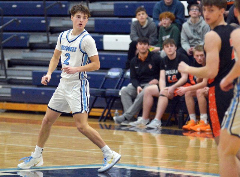 Petoskey senior guard Rider Bartel runs back on defense after hitting a 3-pointer in the second half of Monday's game against Cheboygan.