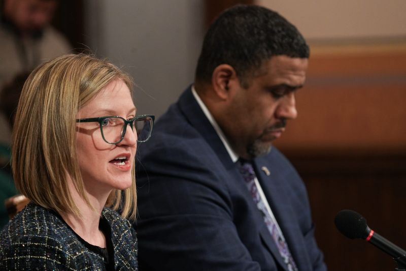 State Budget Director Jen Flood addresses representatives, Wednesday, Feb. 11, 2026, in the House Appropriations room at the state Capitol in Lansing. Also pictured is new acting DTMB Director Kyle Guerrant.