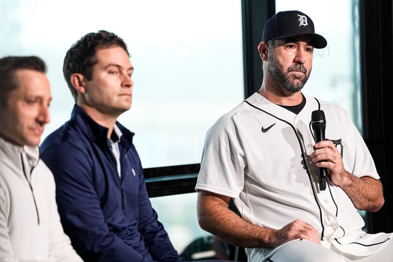 Detroit Tigers pitcher Justin Verlander, right, speaks next to president of baseball operations Scott Harris, center left, and general manager Jeff Greenberg, left, during his introductory press conference at the 34 Club of Joker Marchant Stadium on Thursday, Feb. 12, 2026.