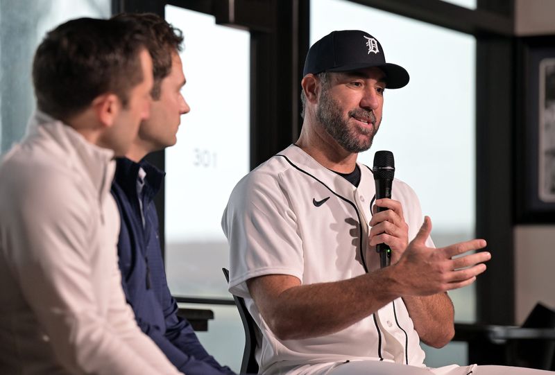 From left, Tigers general manager Jeff Greenberg and president Scott Harris listen as Justin Verlander talks during a press conference at the 34 Club at Joker Marchant Stadium in Lakeland, Fla. on Feb. 12, 2026.