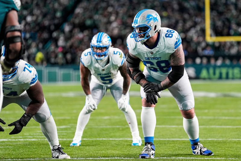 Detroit Lions offensive tackle Taylor Decker (68) gets ready for a play against Philadelphia Eagles during the second half at Lincoln Financial Field in Philadelphia on Sunday, November 16, 2025.
