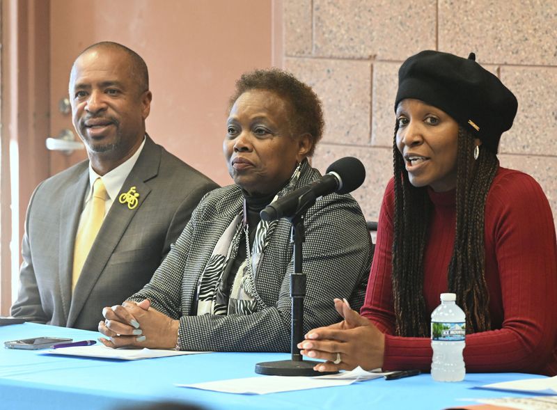 From left, Detroit City Council members Scott Benson and Mary Waters and Heather Herbert of Lakeshore Legal Aid-Homes for Generations warned residents about the growing problem of deed fraud in Detroit at the Farewell Recreation center in Detroit on Feb. 12, 2026.