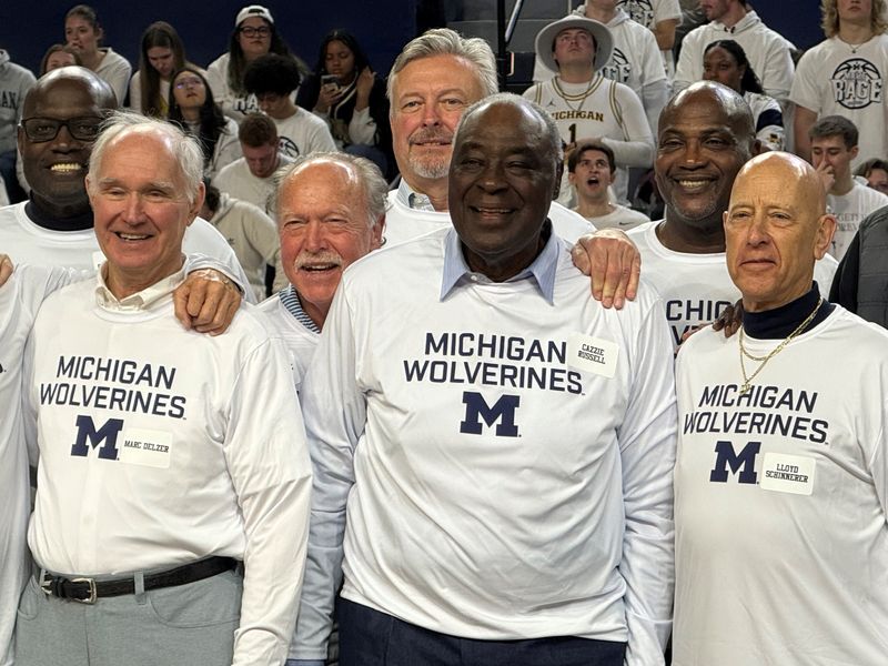 Cazzie Russell and the 1966 Big Ten champion Michigan basketball squad are honored at halftime against UCLA at Crisler Center in Ann Arbor on Saturday, Feb. 14, 2026.