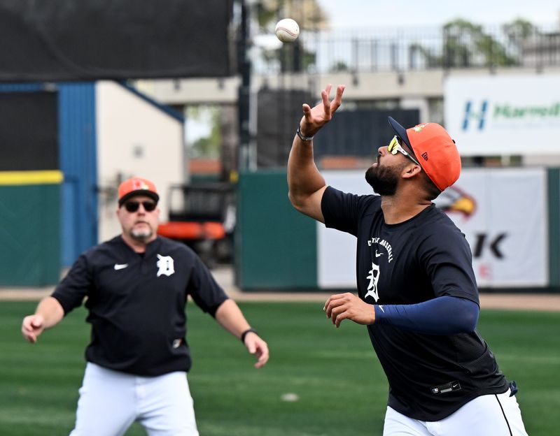 Tigers outfielder Riley Greene catches a ball barehanded during drills during full squad workout at Tigers spring training in Lakeland, Fla. on Feb. 15, 2026.