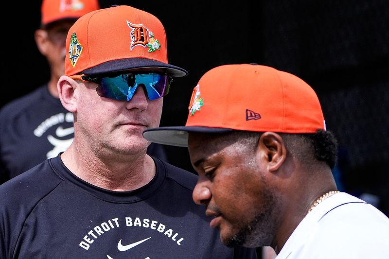 Detroit Tigers manager A.J. Hinch talks to pitcher Framber Valdez at practice during spring training at TigerTown in Lakeland, Fla. on Monday, Feb. 16, 2026.