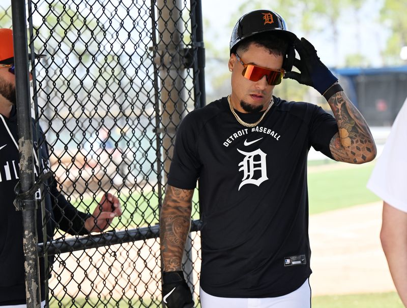 Tigers infielder Javier Báez takes off his helmet after taking live batting practice during the full-squad workout at Tigers spring training Tuesday, Feb. 17, 2026, in Lakeland, Florida.