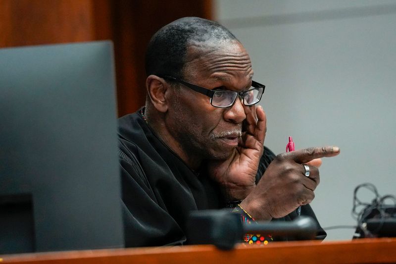 Judge J. Cedric Simpson speaks as former University of Michigan football coach Sherrone Moore makes an appearance at the 14A-1 District Court in Ann Arbor on Tuesday, February 17, 2026. Moore returned to court to continue fighting criminal charges stemming from actions he took at the apartment of a woman with whom he had a two-year affair.