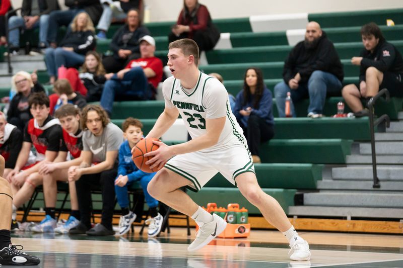 Pennfield senior Peyton Merlington possesses the ball during a game against Northwest at Pennfield High School on Tuesday, Feb. 17, 2026.
