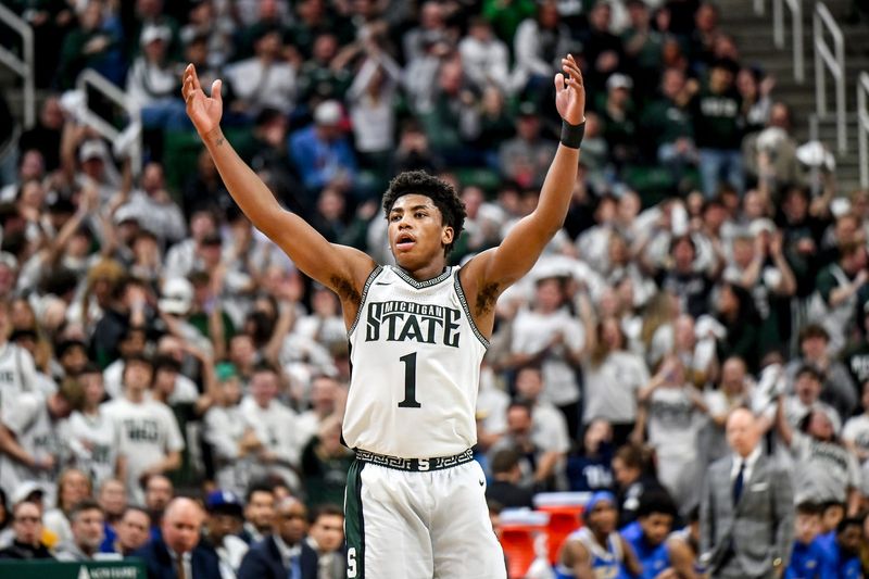 Michigan State's Jeremy Fears Jr. celebrates after a Coen Carr dunk against UCLA during the second half on Tuesday, Feb. 17, 2026, at the Breslin Center in East Lansing.