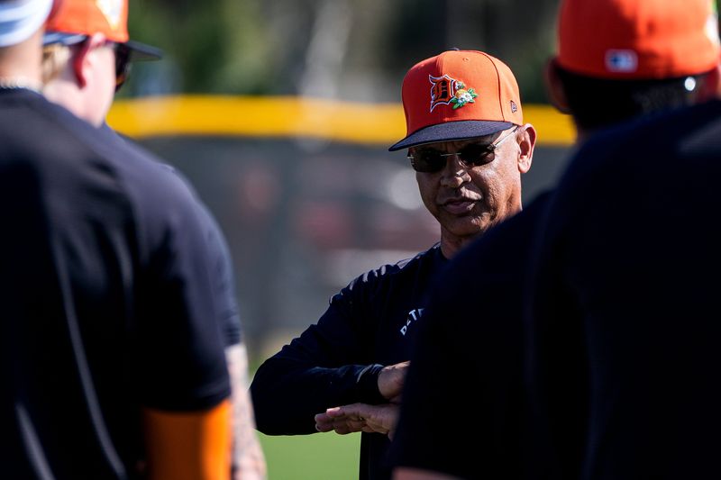Detroit Tigers third base coach Joey Cora talks to players before a drill at practice during spring training at TigerTown in Lakeland, Fla. on Thursday, Feb. 19, 2026.