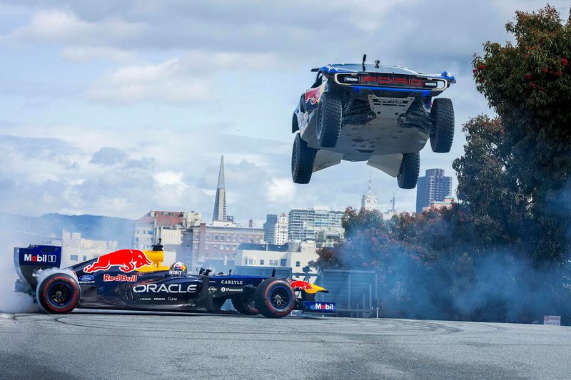 Mitch Guthrie Jr. and Scott Speed perform in the streets of San Francisco on Wednesday, Feb. 18, 2026.