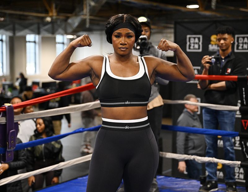 Claressa Shields poses for a photo before she works out with her trainer, John David-Jackson, at the Downtown Boxing Gym in preparation for her fight against Franchon Crews-Dezurn.