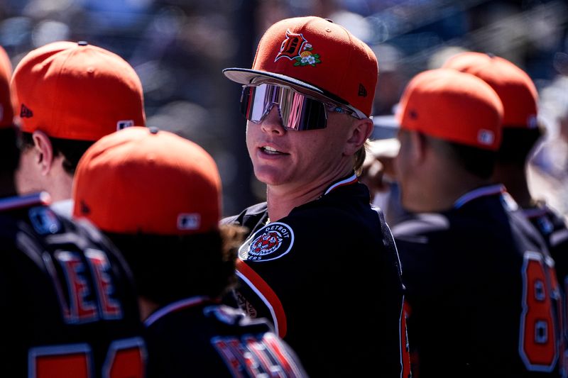 Detroit Tigers outfielder Max Clark talks to teammates in the dugout during the second inning against New York Yankees at George M. Steinbrenner Field in Tampa, Fla. on Saturday, Feb. 21, 2026.
