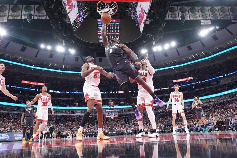 Detroit Pistons center Jalen Duren (0) dunks the ball on Chicago Bulls forward Jalen Smith (25) during the first half at United Center in Chicago on Saturday, Feb. 21, 2026.