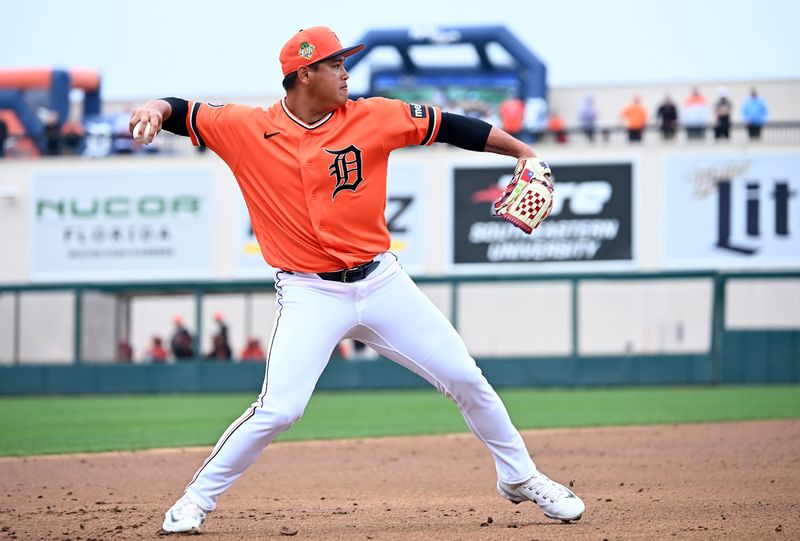 Tigers third baseman Hao-Yu Lee makes a throw to first in the second inning as the Detroit Tigers take on the Baltimore Orioles at Joker Marchant Stadium in exhibition in Lakeland, Fla. on Feb. 22, 2026.