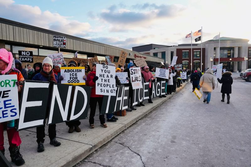 Hundreds of protestors stand outside of Romulus City Hall to protest the proposed ICE detention warehouse in Romulus, Michigan, Monday, Feb. 23, 2026.
