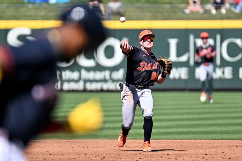 Detroit Tigers shortstop Kevin McGonigle (85) throws to first base in the second inning against the Atlanta Braves during spring training at CoolToday Park in North Port, Florida, on Tuesday, Feb. 24, 2026.