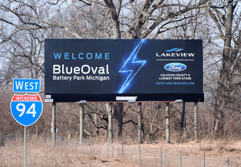 A highway billboard sign by Lakeview Ford at exit 108 off I-94 West in Marshall welcoming the Ford Motor Company BlueOval Battery Park Michigan in Marshall on Wednesday, Feb. 26, 2026.