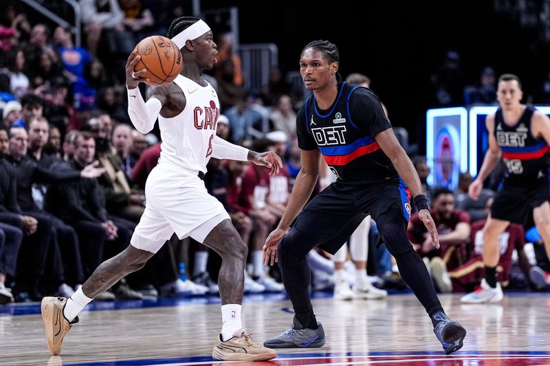 Detroit Pistons guard Ausar Thompson (9) defends Cleveland Cavaliers guard Dennis Schroder (8) during the second half at Little Caesars Arena in Detroit on Friday, Feb. 27, 2026.