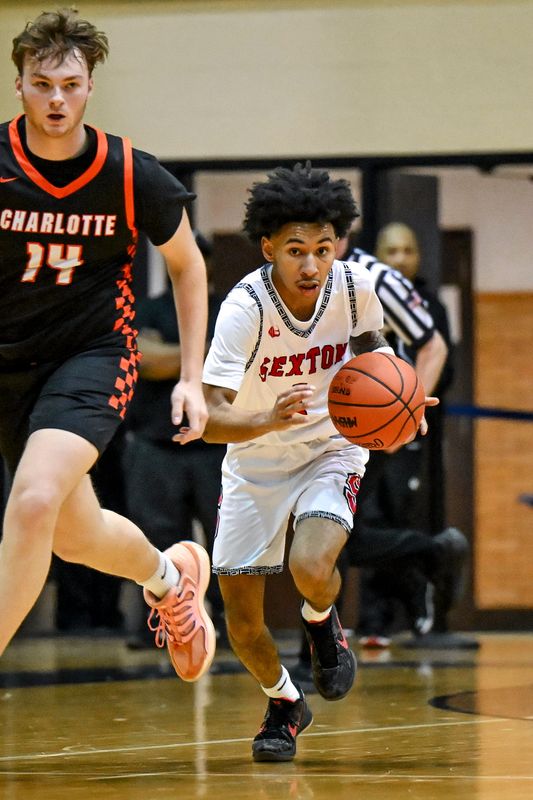 Sexton's Keyshawn Summerville moves the ball against Sexton during the second quarter on Friday, Feb. 27, 2026, at the Don Johnson Fieldhouse in Lansing.