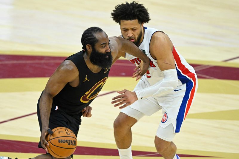 Cleveland Cavaliers guard James Harden (1) dribbles beside Detroit Pistons guard Cade Cunningham (2) in the fourth quarter at Rocket Arena in Cleveland on Tuesday, March 3, 2026.