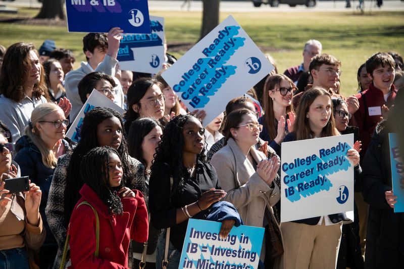 About 200 students from different international Baccalaureate schools demonstrate, Wednesday, March 4, 2026, at the state Capitol in Lansing calling on Michigan lawmakers to support a resolution encouraging fair college credit transfers.