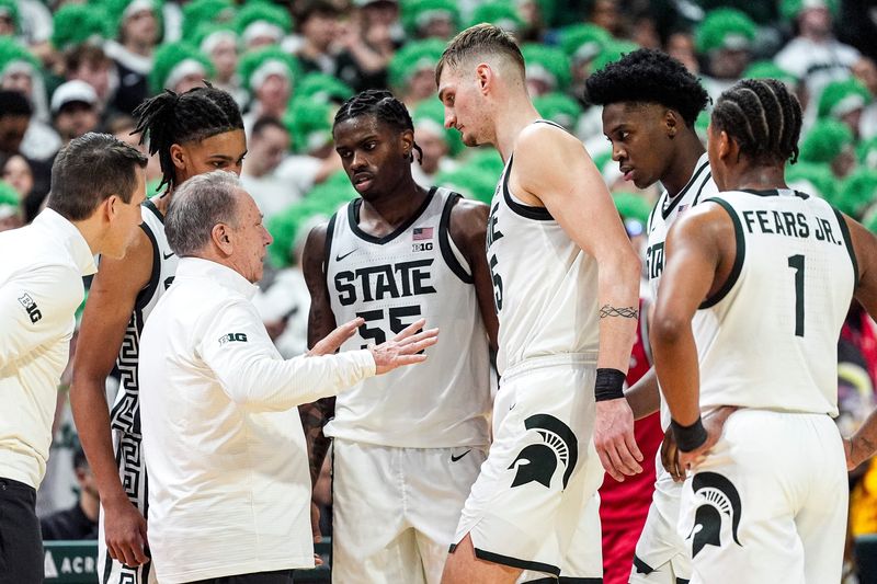 Michigan State head coach Tom Izzo talks to players at a timeout against Rutgers during the second half at Breslin Center in East Lansing on Thursday, March 5, 2026.