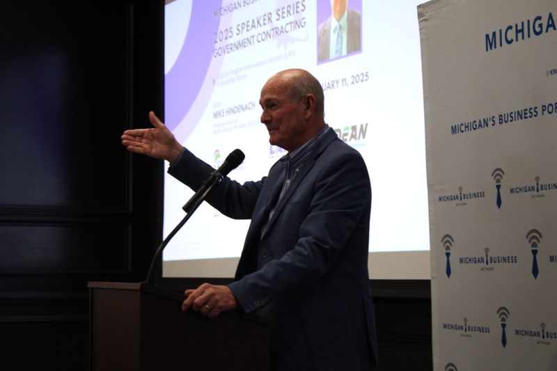 Chris Holman makes a presentation as part of a recent Michigan Business Network Speakers Series. He is the founder and CEO of MBN.
