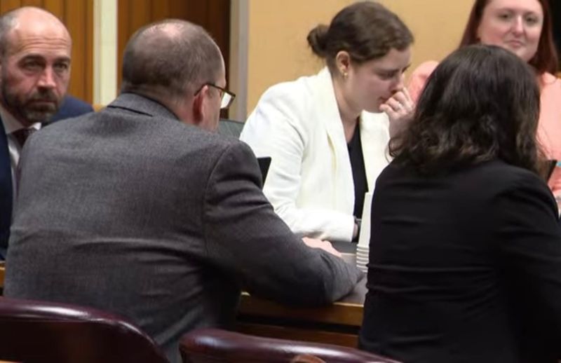 Dale Warner (left center) awaits news on alternate jurors March 6 in Lenawee County's 39th Circuit Court.