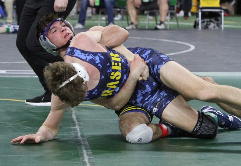 Hartland's Bodie Abbey beat Fraser's Ethan Miller during the first round of the MHSAA individual wrestling finals on Friday, March 6, 2026 at Ford Field.