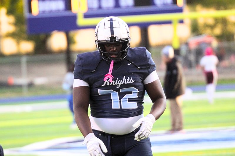 Kalamazoo Loy Norrix offensive tackle Jakari Lipsey is a four-star recruit verbally committed to Michigan.